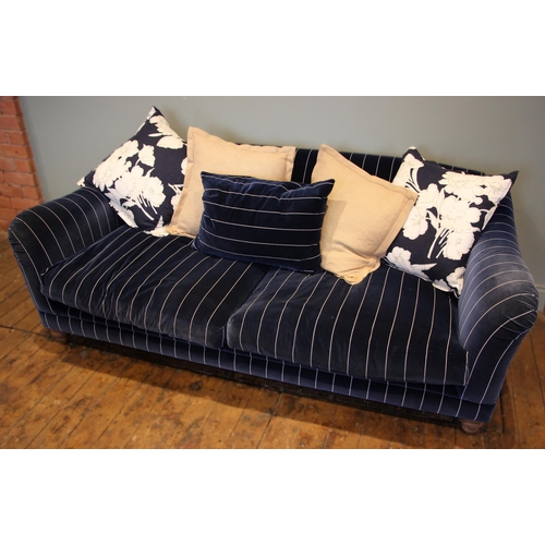 862 - A Tetrad 'Gatsby' sofa in Ralph Lauren striped blue fabric, upon turned hardwood legs, with five ass... 