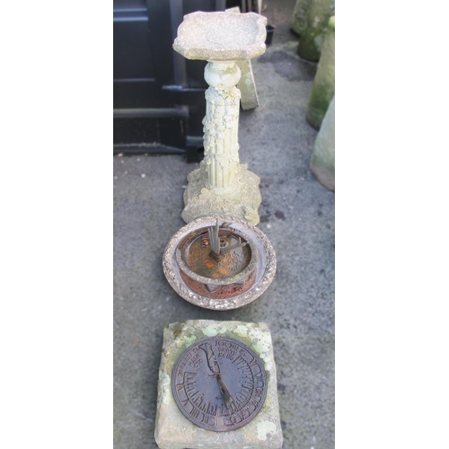 869 - A reconstituted pedestal bird bath, the fluted column moulded in relief with mice and climbing ivy, ... 