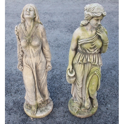 875 - Two reconstituted garden ornaments, each modelled as a classical female figure wearing robes, 107cm ... 