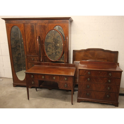 826 - An Edwardian mahogany three piece bedroom suite, comprising a compactum wardrobe with a moulded and ... 