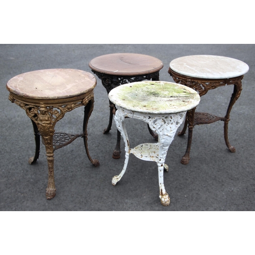 879 - Four cast iron Britannia pub tables, each with a circular hardwood top upon relief cast supports (4)... 