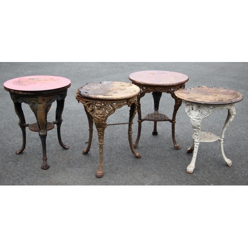 881 - Four cast iron Britannia pub tables, each with a circular hardwood top upon relief cast supports (4)... 