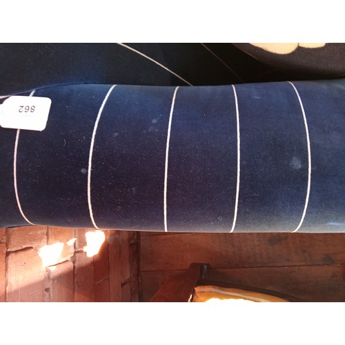 862 - A Tetrad 'Gatsby' sofa in Ralph Lauren striped blue fabric, upon turned hardwood legs, with five ass... 