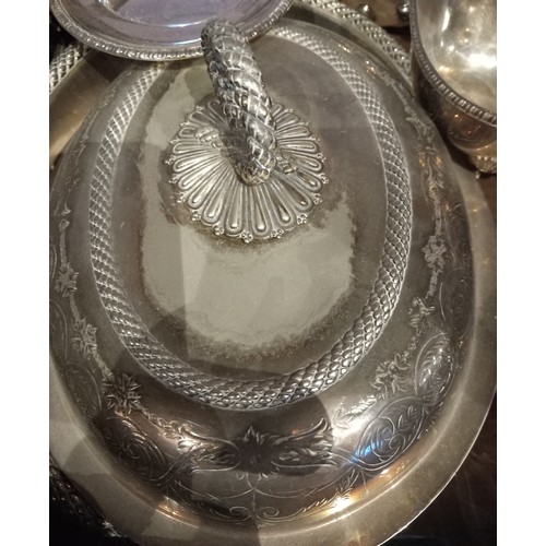 103 - A large selection of silver plated items, to include a large twin handled tray, stamped 'JM Trotter'... 