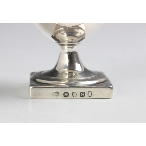 14 - A George III silver muffineer, indistinct makers mark, London 1808, the pierced domed removeable cov... 