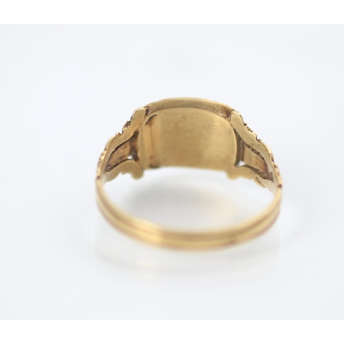 178 - A 19th century style yellow metal mourning ring, the central vacant locket within carved mount and c... 