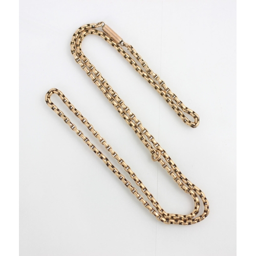 180 - A yellow metal chain, the trace link chain with barrel fastening, unmarked, 50cm long, 7.9gms