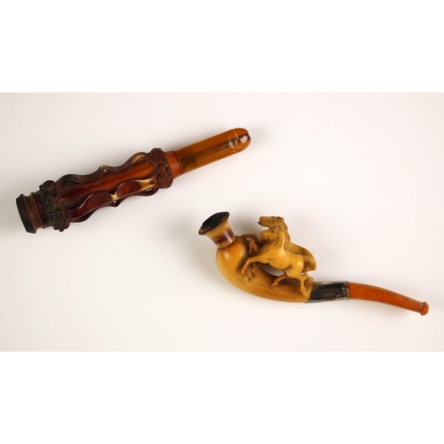 248 - A Meershaum pipe, late 19th/early 20th century, carved with two horses to terminal, 11.5cm long, wit... 