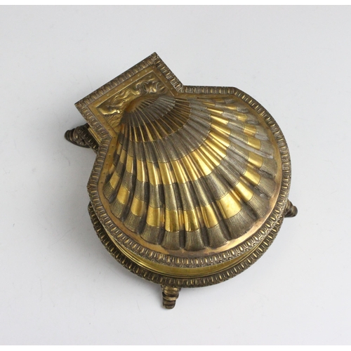 5 - A Victorian silver gilt ink well, Robert Garrard, London 1881, designed as a shell, the hinged cover... 