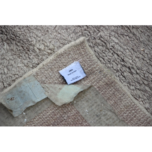 730 - An Oka Skye linen rug, in mottled grey, 40% linen, 40% viscose, 20% cotton, 244cm x 305cm