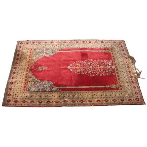 735 - A Persian bamboo silk prayer rug, the central red field with a foliate urn, flanked by vertical colu... 