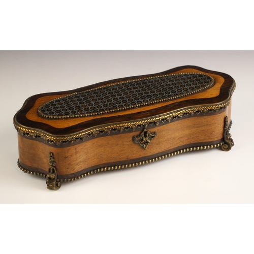 743 - A French walnut and rosewood serpentine jewellery casket, mid-19th century, the hinged cover applied... 