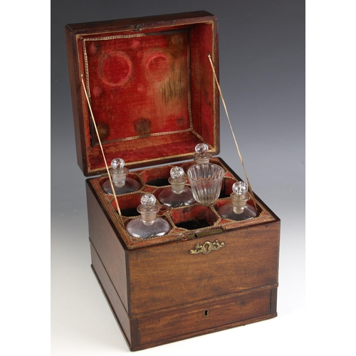 744 - A George III mahogany apothecary box, the hinged cover with a brass swan neck swing handle opening t... 