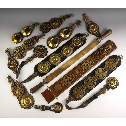 759 - A collection of horse brasses, 19th century and later, the majority to leather martingales, to inclu... 