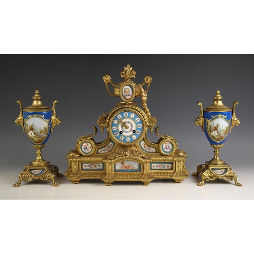 765 - A French Japy Freres gilt metal and bleu celeste porcelain clock garniture, late 19th century, the s... 