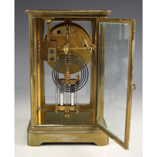 766 - A French four glass mantel clock, early 20th century, the bevelled glass case enclosing a 9cm dial a... 