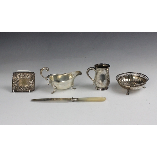 77 - A selection of five silver items, including a George V silver bonbon dish, Goldsmiths and Silversmit... 