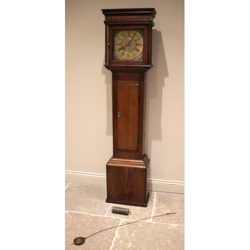 771 - A George III oak cased thirty hour longcase clock signed Thomas Lindall, the flat top hood with a nu... 