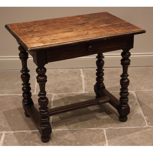 781 - An early 18th century walnut side table, the rectangular moulded top over a single frieze drawer, up... 