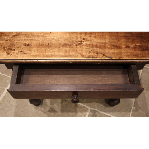 781 - An early 18th century walnut side table, the rectangular moulded top over a single frieze drawer, up... 