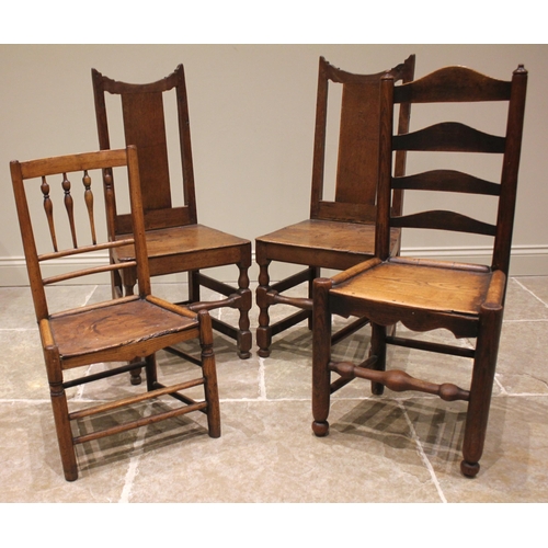 787 - A pair of 18th century oak hall chairs, each with a splat back over a board seat upon baluster and b... 