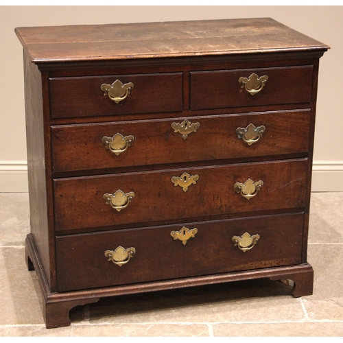 790 - An early 18th century oak chest of drawers, the twin plank moulded top over an arrangement of two sh... 