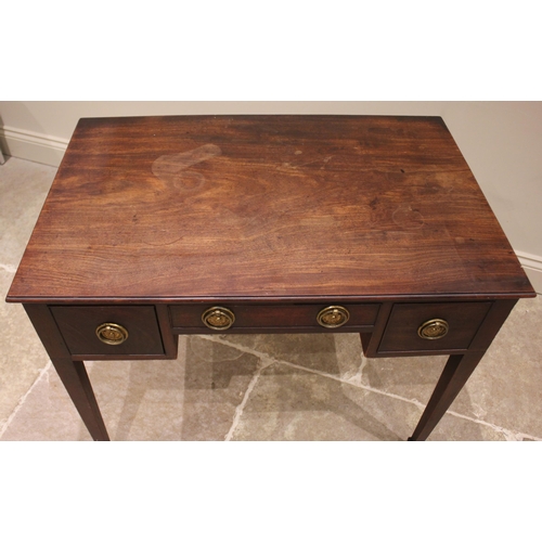 797 - A George III mahogany low boy/side table, of cottage proportions, the rectangular moulded top over a... 