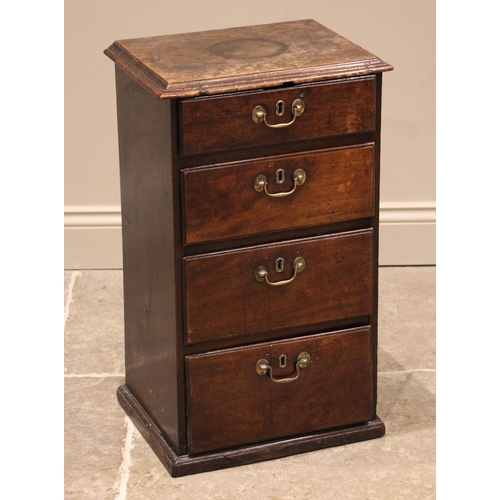 801 - A George III mahogany pedestal chest, the rectangular moulded top over four graduated and lip moulde... 