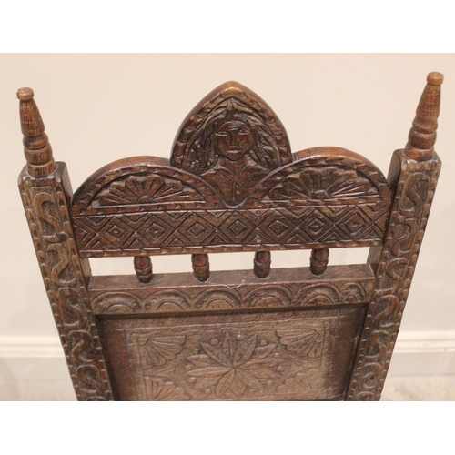 836 - A trio of carved oak hall/side chairs in the 17th century style, late 19th century, each with spire ... 