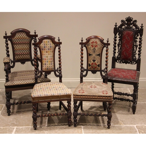 843 - A 19th century rosewood and upholstered elbow chair, the shield shaped padded back flanked by barley... 