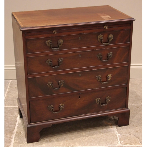 844 - A mahogany and rosewood cross banded bachelors chest, 19th century, the moulded top over a brushing ... 