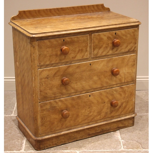 848 - A Victorian scumbled pine chest of drawers, the rectangular top with rounded front corners and rear ... 