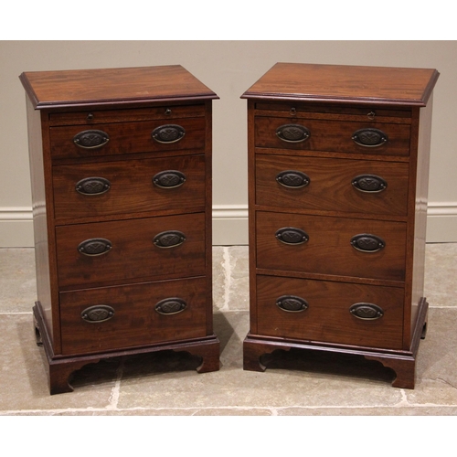 866 - A pair of mahogany pedestal chests, 19th century and later, each with a rectangular moulded top over... 