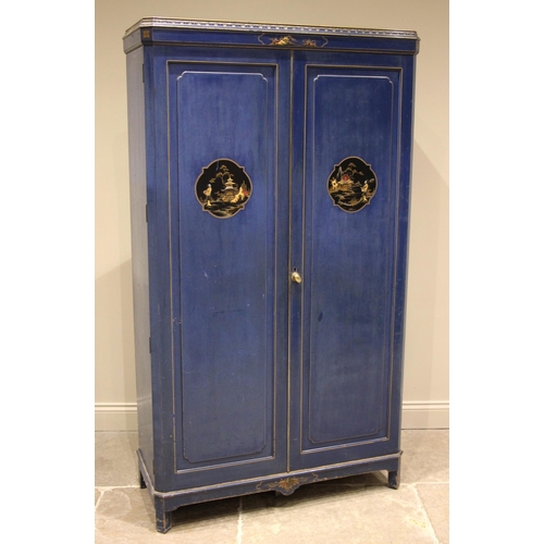 888 - A blue chinoiserie wardrobe/linen press, early 20th century, the flat top cornice with canted corner... 