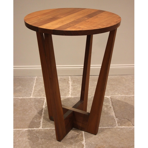 906 - A Heals Riva French walnut '1920 IDA 14' Parla bar table, the circular top upon four wedge shaped su... 