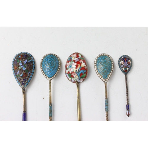 93 - A group of five silver gilt and enamel Russian spoons, including a Moscow example, with 84 kokoshnik... 