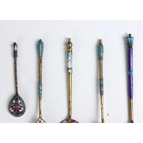 93 - A group of five silver gilt and enamel Russian spoons, including a Moscow example, with 84 kokoshnik... 