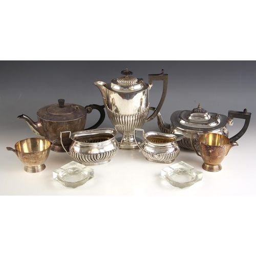 104 - An Art Deco style silver plated tea service, comprising hot water jug, tea pot, sugar bowl and milk ... 