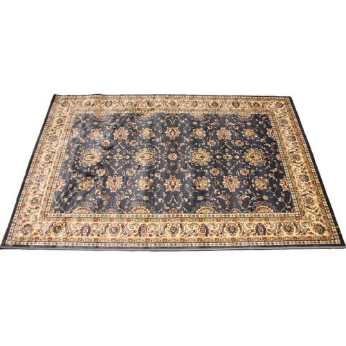 720 - A Kashmir rug, all over floral design, upon a sky blue ground, within a trailing ivory border, 170cm... 