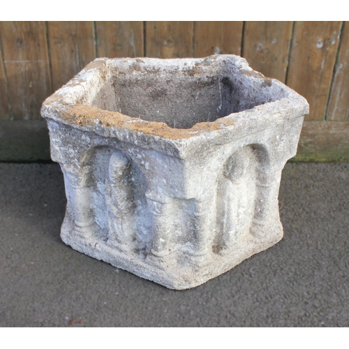 924 - ERNEST SHACKLETON INTEREST; a carved stone pentagonal font or planter, each of the arcaded sides cen... 