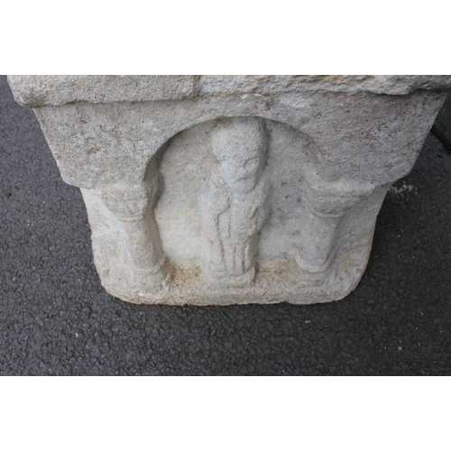 924 - ERNEST SHACKLETON INTEREST; a carved stone pentagonal font or planter, each of the arcaded sides cen... 