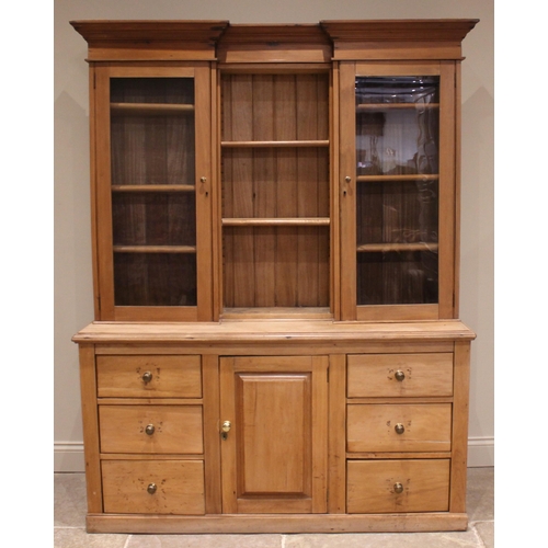 877 - A Victorian satin walnut and pine kitchen dresser, the inverted breakfront top with open shelves fla... 