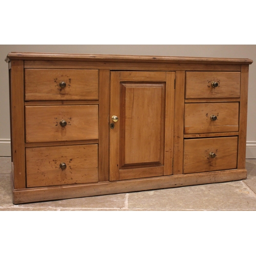 877 - A Victorian satin walnut and pine kitchen dresser, the inverted breakfront top with open shelves fla... 