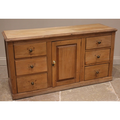 877 - A Victorian satin walnut and pine kitchen dresser, the inverted breakfront top with open shelves fla... 