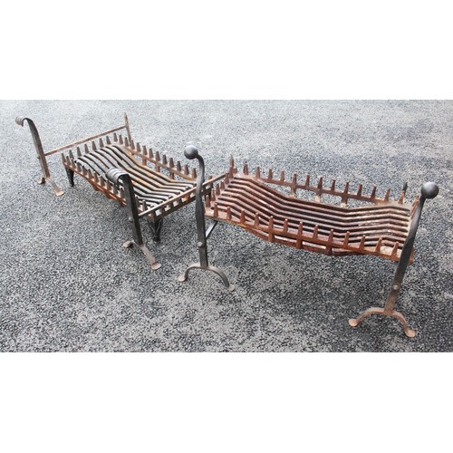 750 - A pair of wrought iron blacksmith made fire dogs of country house proportions, early 20th century, t... 