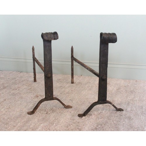 750 - A pair of wrought iron blacksmith made fire dogs of country house proportions, early 20th century, t... 