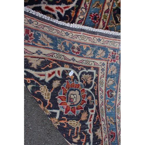 714 - A rich blue ground Persian Kashan carpet, the Shabazz lozenge medallion on a royal blue ground with ... 