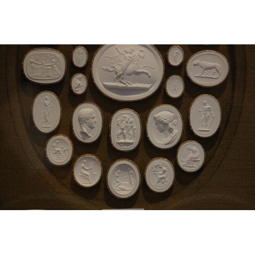 655 - Two Grand Tour style framed and glazed classical plaster intaglio displays, probably early 20th cent... 