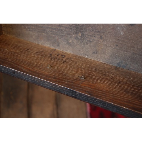 790 - An early 18th century oak chest of drawers, the twin plank moulded top over an arrangement of two sh... 