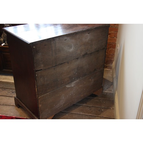 790 - An early 18th century oak chest of drawers, the twin plank moulded top over an arrangement of two sh... 